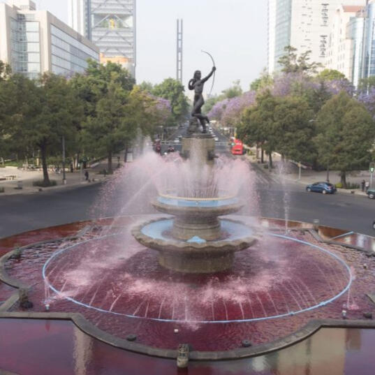 fountain "la diana" in mexico city tinted with red coloring.