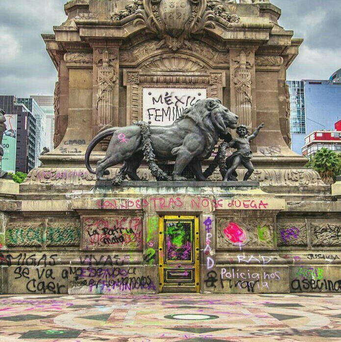 fountain "la diana" in mexico city tinted with red coloring.